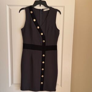 Sleeveless Black Mini Sheath Dress with Gold Buttons